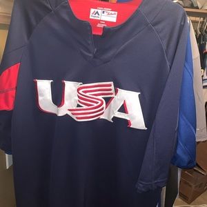 USA Baseball 3/4 batting practice top. Never worn. Size medium.